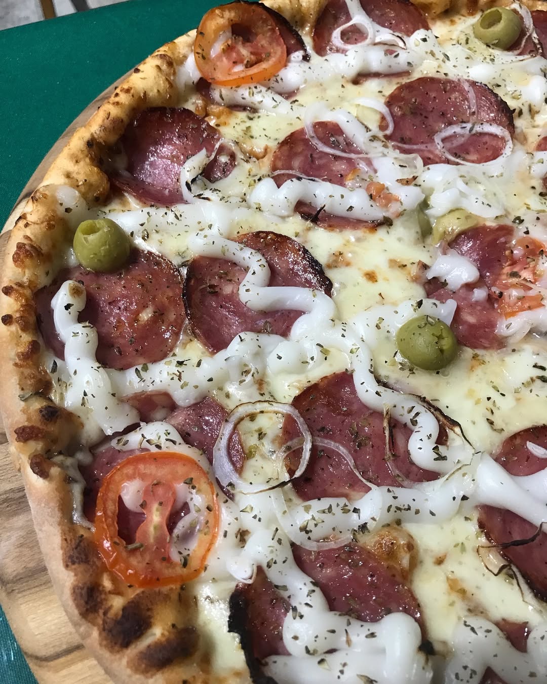 Pizza entregue a cliente